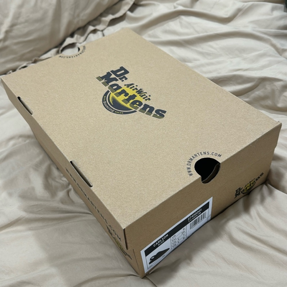 Carlson black Doc martens.